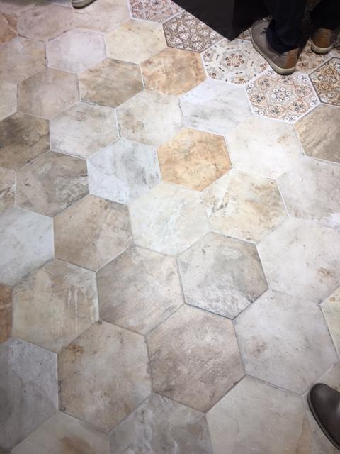 Here's a variety of hexagons - in different solid patterns with a traditional cement tile pattern patchwork.