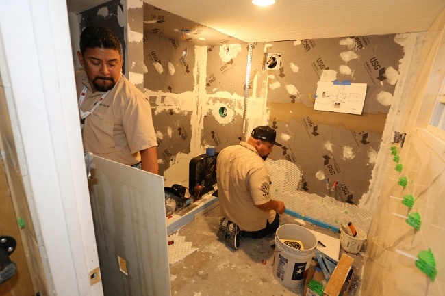 J&R Tile team working on the tiny house bathroom