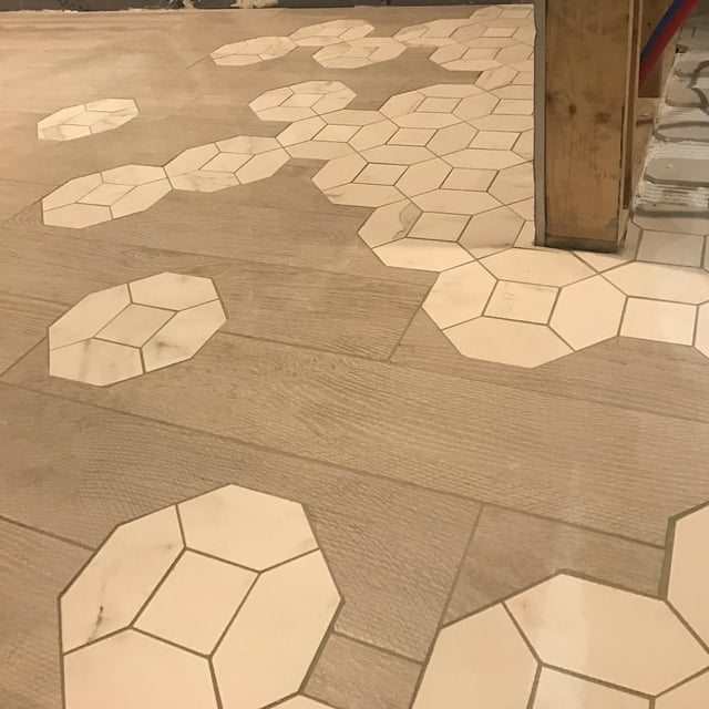 From Octagon to Wood Plank Tile Floor in the Vitruvian tiny house