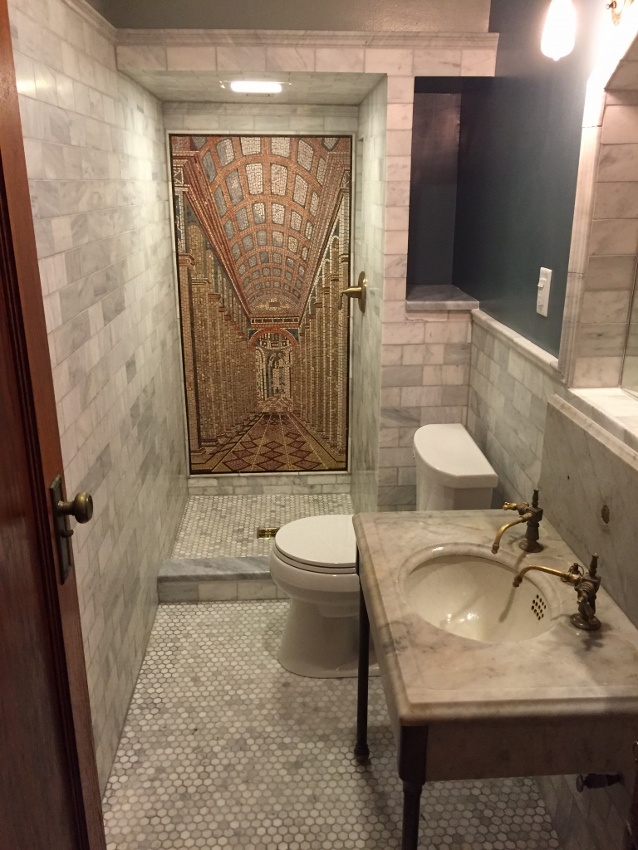 Late 20s phone room converted into a bathroom in Joliet, Illinois