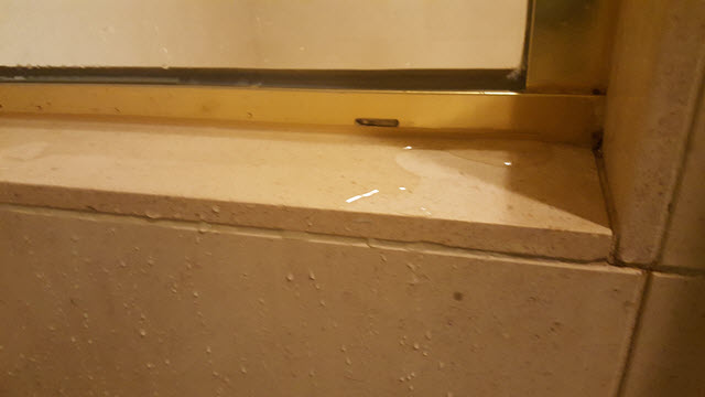 All Shower Surfaces Must Slope to the Drain
