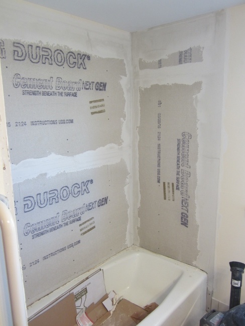 Properly waterproofing a tile shower: cement board layout with taped seams