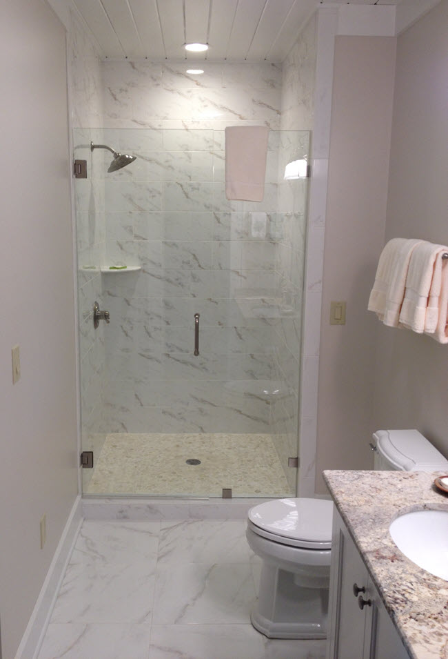 A full bathroom tile installation by Installations By Alex