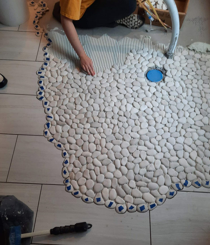 Carefully placed pebble stone floor