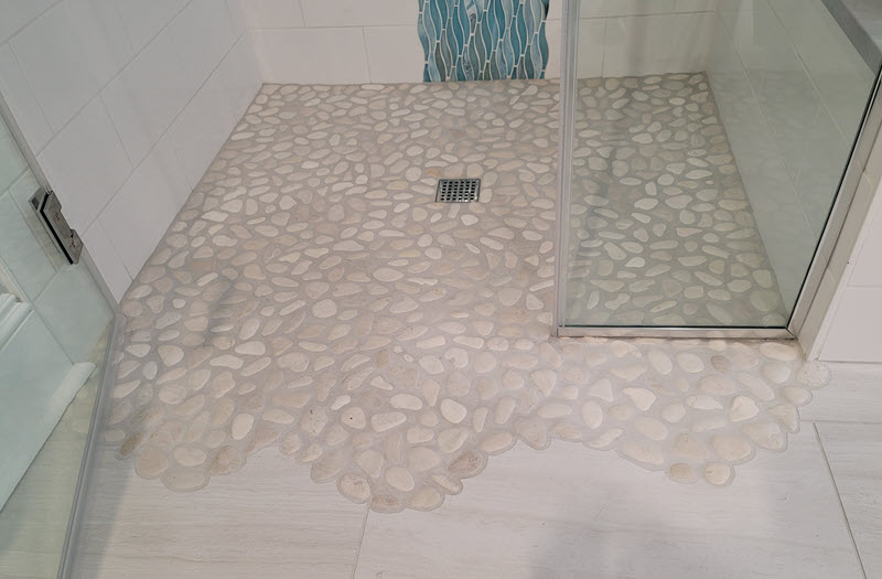 Finished pebble floor shower