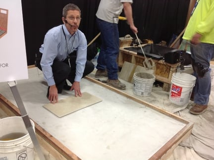 Scott Carothers demonstrating ceramic tile installation best practices.