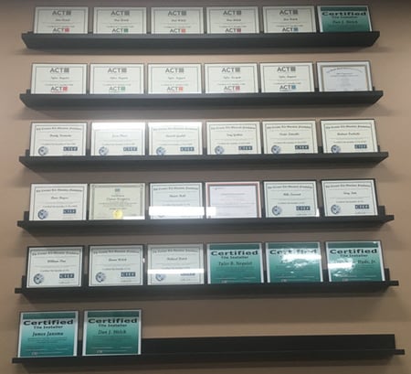 Promote your tile certifications by showing them off on a wall as Welch Tile does.